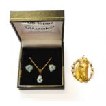 A 9 Carat Gold Cultured Pearl Horse Pendant, length 4.2cm; and A Blue Topaz and Diamond Pendant on