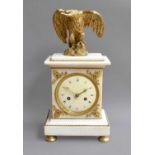 A French Marble Striking Mantel Clock, 19th century, surmounted by a gilt bronze eagle, 4-inch