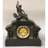 A Victorian Slate Striking Mantel Clock, with figural surround, 42cm high