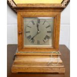 A German Oak Striking Mantel Clock, movement stamped W & H, 30cm highThe case is slightly faded.