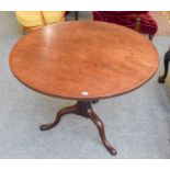 A George III Mahogany Circular Tilt-Top Tripod Table, 87cm diameter by 72cm high