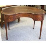 A Late Victorian Mahogany Leather-Inset Reniform Writing Table, 106cm by 62cm by 75cmLeather