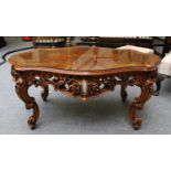 A Modern French Cross-Banded Walnut Coffee table, the marquetry inlaid shaped top on an