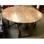 An 18th Century Oak Gateleg Table, 138cm by 35cm by 72cm