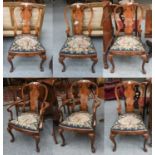 A Set of Six Queen Anne Style Figured Walnut Dining Chairs, including a pair of carver armchairs,