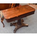 A Regency Rosewood Foldover Card Table, with faceted supports, waisted X form base and scroll