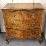 A Reproduction Cross-Banded Burr Walnut Chest of Drawers, with serpentine front, 77cm by 49cm by