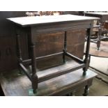 An 18th Century Oak Side Table, the turned supports joined by stretchers, 90cm by 54cm by 71cm,