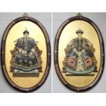 A Pair of Chinese Composite Wall Mounting Plaques, depicting a seated Emperor and Empress on gold