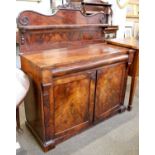 A Victorian Mahogany Chiffonier, with carved scrolling pediment, concealed frieze drawer and