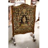 A 19th Century Mahogany Firescreen, with silkwork panel and further lift-up panel, 51cm by 103cm