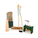 Ian McKay: Sneezing Girl, painted wood and cotton, clothes peg mechanism, signed in red pen, 38cm