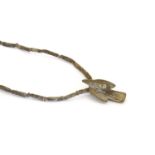 John Maltby (1936-2020): Necklace, stoneware, long and round beads, hung with a bird, impressed M