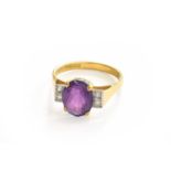 An 18 Carat Gold Amethyst and Diamond Ring, finger size M1/2Gross weight 3.5 grams.