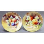 A Pair of Royal Worcester Style Cabinet Plates, by Keith Hancock, painted with apples, plums and