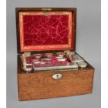 A 19th century Mother of Pearl Inlaid Mahogany Vanity Box, with fully fitted interior holding an