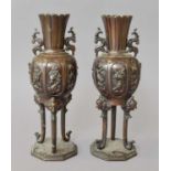 A Pair of Japanese Bronze 19th Century Style Vases, cast in relief with panels of birds, raised on