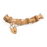 A Gate Link Bracelet, with heart-shaped padlock clasp, length 20.5cmPadlock and bracelet stamped '