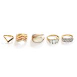 Five Rings, including a silver mother-of-pearl Clogau ring, finger size P1/2; a white stone wishbone
