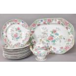 A Spode New Stone Dinner Service, printed and painted with chinoiserie foliage, printed and