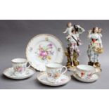 After Meissen, a Pair of Volkstedt Rural Figures, the tallest 25cm; together with a group of Dresden