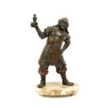 A Japanese Bronze Figure of a Samurai, Meiji period, standing holding a bottle in his raised right