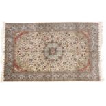 Kayseri Silk CarpetCentral Anatolia, modernThe cream field of vines and flowers centred by a