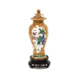 A Chinese Porcelain Vase and Cover, mid 18th century, of baluster form, painted in famille rose