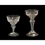 A Champagne or Sweetmeat Glass, circa 1750, the ogee bowl on a pedestal stem and domed base with
