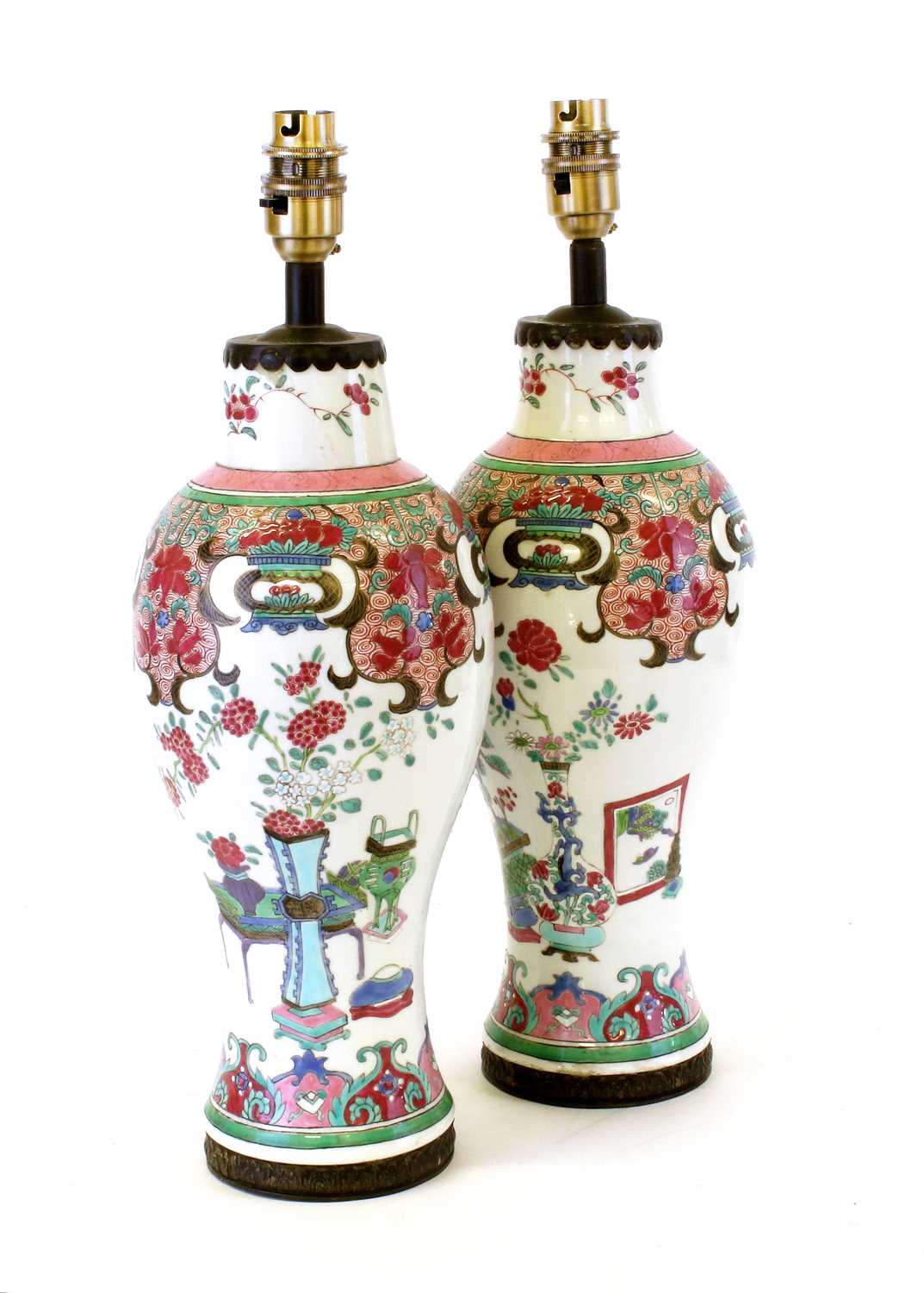A Pair of Chinese Porcelain Vases, Yongzheng/Qianlong, of baluster form, painted in famille rose