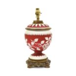 A Victorian Metal-Mounted Cameo Glass Lamp Base, probably Thomas Webb, circa 1880, in deep red