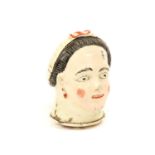 A Creamware Snuff Box and Screw Cover, circa 1780, modelled and painted as the head of a young