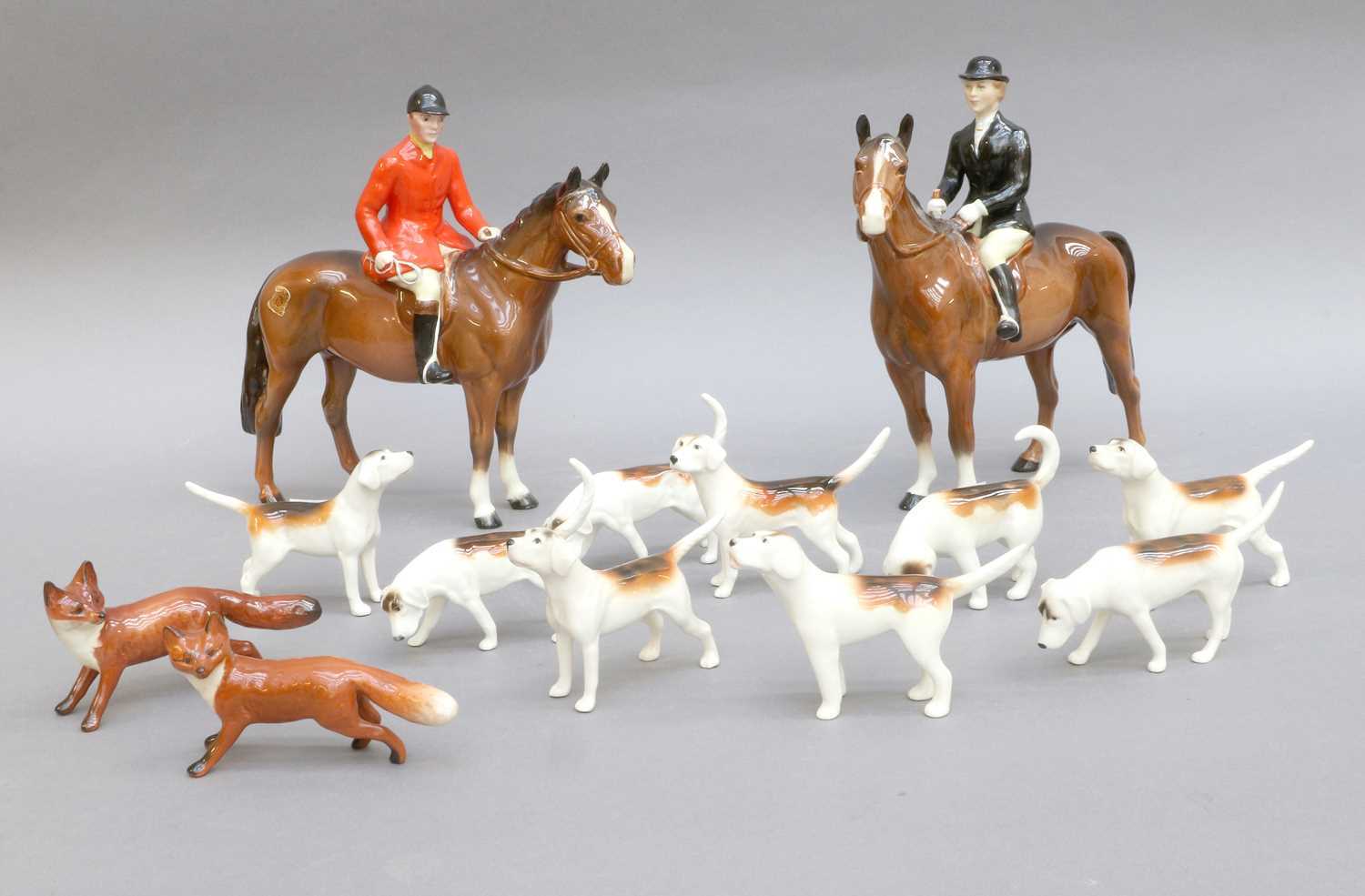 Beswick Hunting Group Comprising: Huntsman (Standing), Style Two, model No. 1501 and Huntswoman (