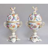 A Pair of 20th Century Dresden Twin-Handled Vases and Covers, floral encrusted and surmounted by