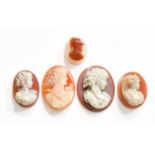 Four Hardstone Cameos and A Shell Cameo (a.f.)The pieces are in poor condition with multiple chips