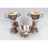 A James Macintyre & Co Aurelian Pottery Garniture by Willliam Moorcroft, decorated with stylised