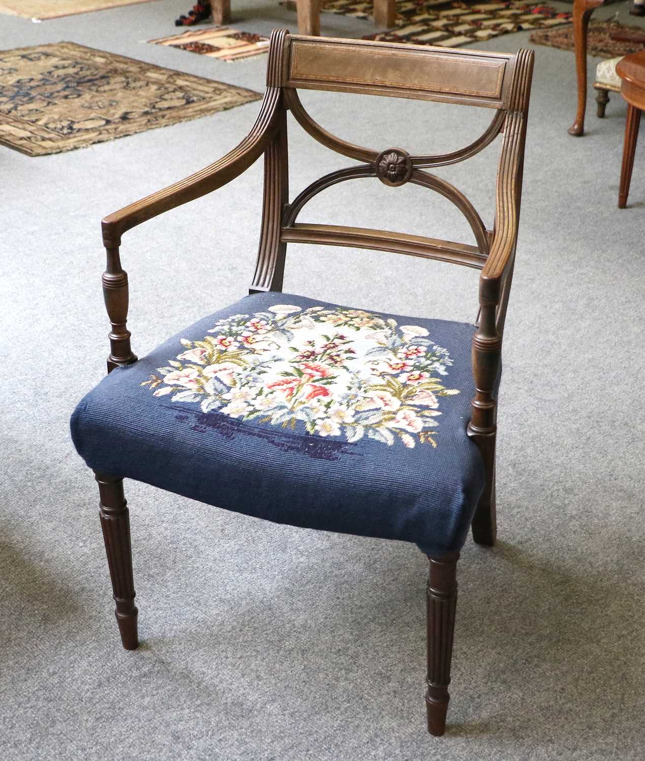 A Set of Six Regency Carved Mahogany Dining Chairs, with drop-in seats and raised on sabre supports; - Image 2 of 3