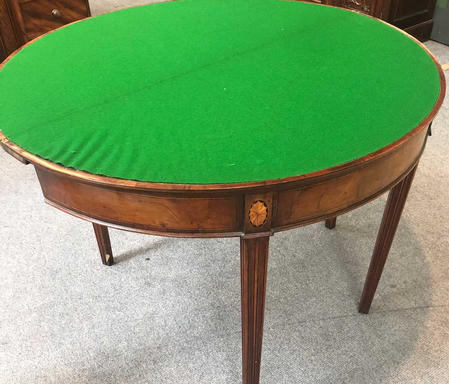 A George III Mahogany Demi Lune Fold Over Card Table, cross banded with fan paterer and on reeded - Image 3 of 9