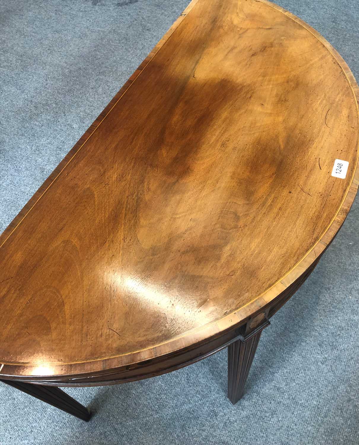 A George III Mahogany Demi Lune Fold Over Card Table, cross banded with fan paterer and on reeded - Image 5 of 9