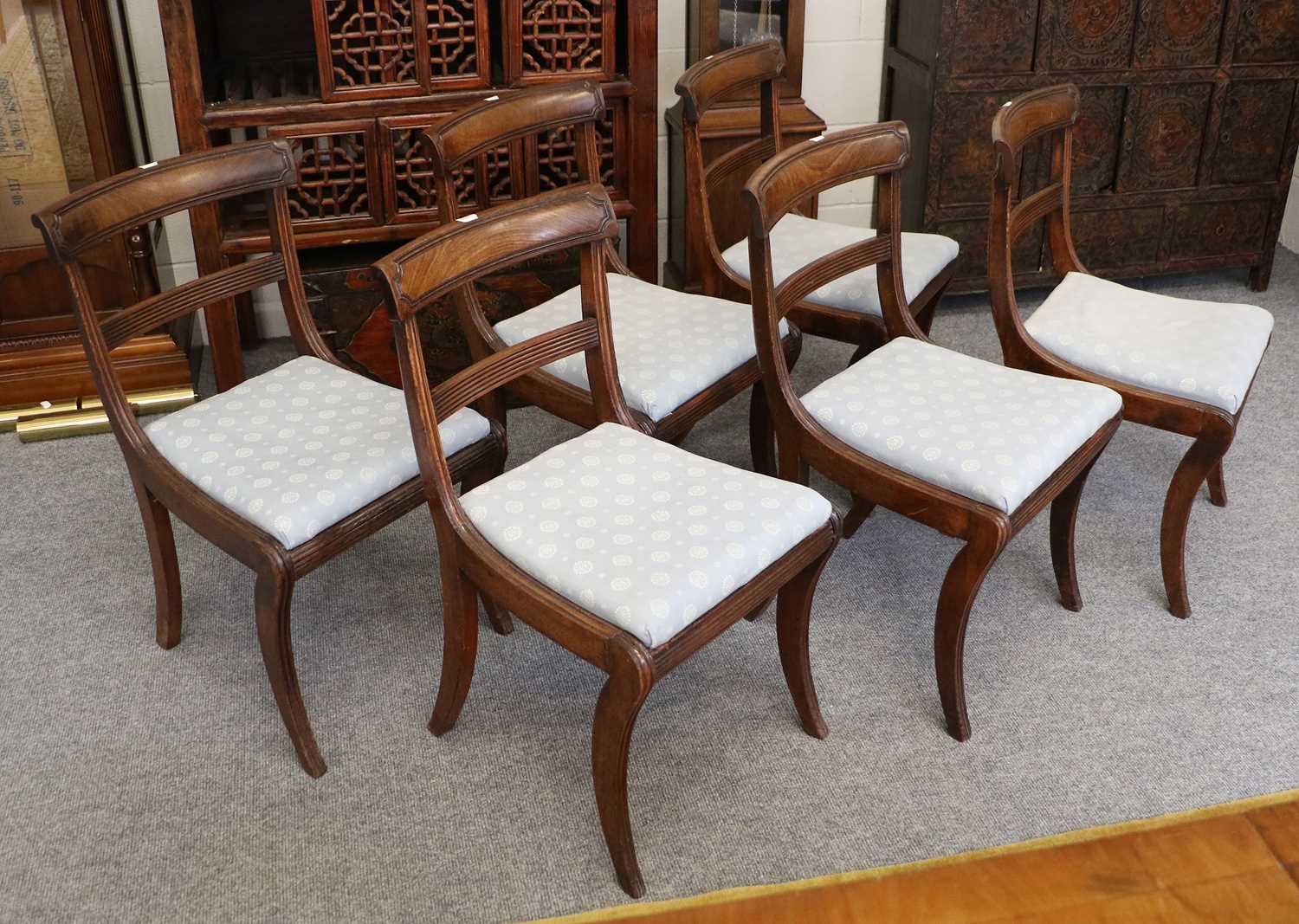 A Set of Six Regency Carved Mahogany Dining Chairs, with drop-in seats and raised on sabre supports; - Image 3 of 3