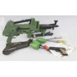 A Johnny Seven One Man Army Gun, with instructions and various parts including missiles (a/f) and