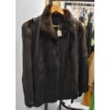 Dark Mink Fur Jacket with leather ties to the neckGood condition 42" bust, possibly size 10-12.