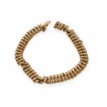 A Fancy Link Bracelet, tongue stamped '15CT', length 21.5cm (a.f.)Gross weight 17.2 grams.