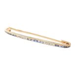 A Sapphire and Diamond Bar Brooch, calibré cut sapphires spaced by rose cut diamonds, length 5.