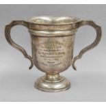 A George V Silver Two-Handled Cup, by Elkington and Co., Birmingham, 1915, tapering and on spreading