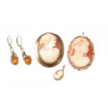 Two Cameo Brooches, one frame hallmarked 9 carat gold, the other stamped '375'; A Cameo Pendant,