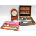 A Mahogany Cased Chemistry Set, by Rancheti of Market Street, Manchester, A Saccharometer, by Buss