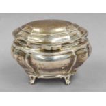An Edward VII Silver Tea-Caddy, by Charles Stuart Harris, London, 1903, tapering oval and on four