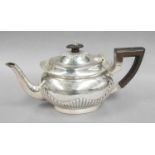 A George V Silver Teapot, by William Lister and Sons, Sheffield, 1913, oval and with fluted lower