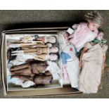 A Collection of Dolls, including a bisque head example in traditional native Amercain dress (head